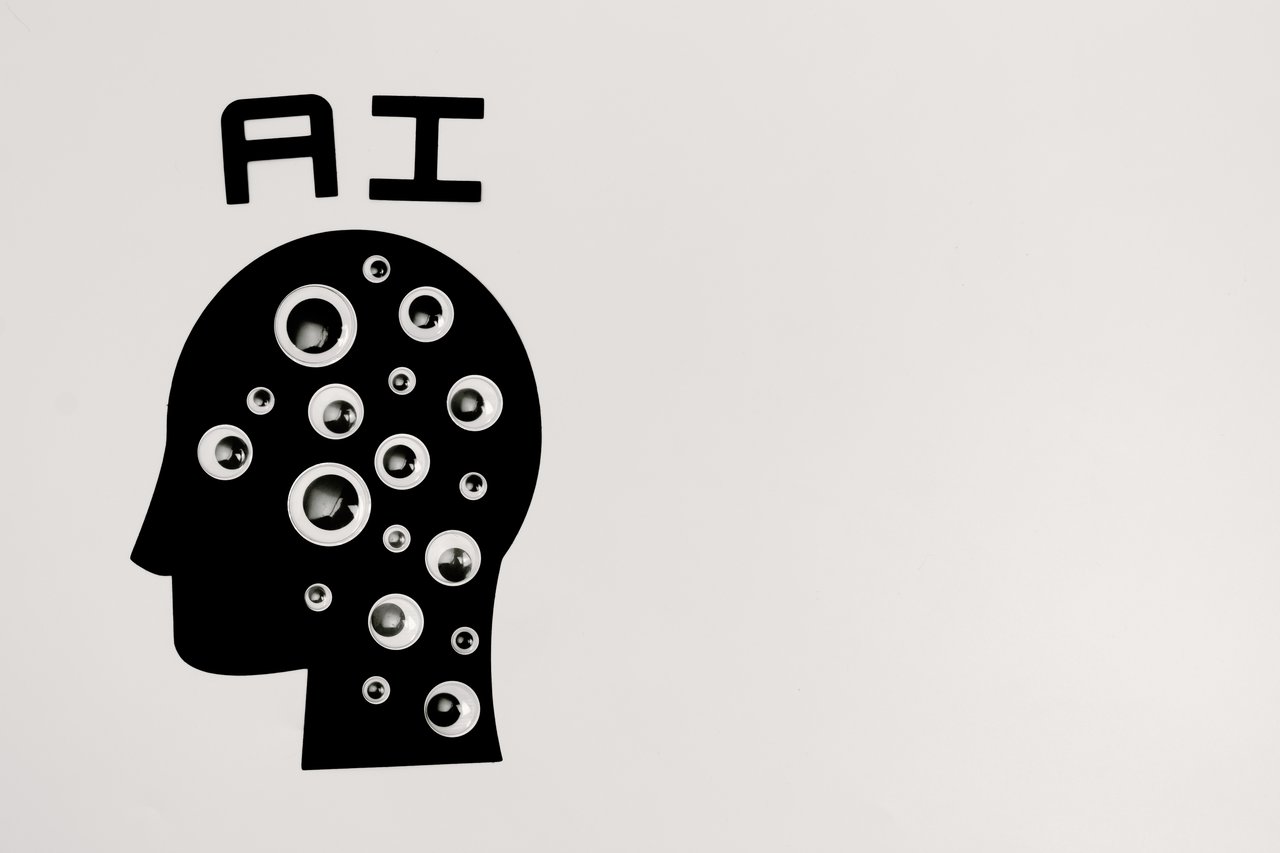 Contact Abstract illustration of AI with silhouette head full of eyes, symbolizing observation and technology.